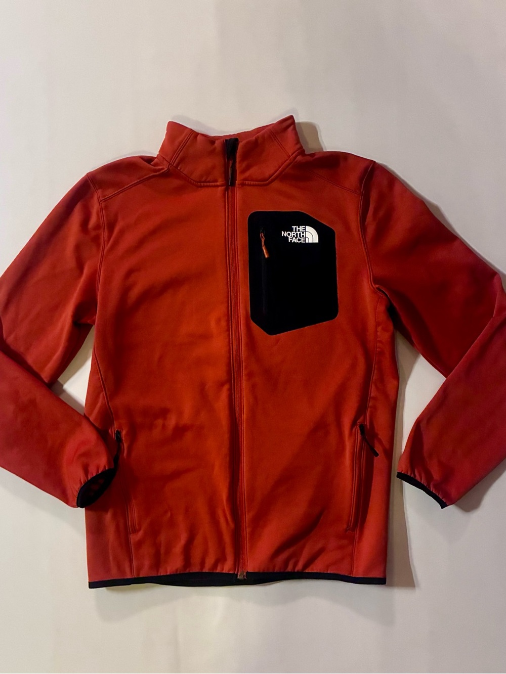 The North Face  Orange 🍊 Full-Zip Softshell Jacket with Black Chest Pocket